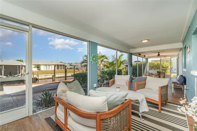 a living room with large windows