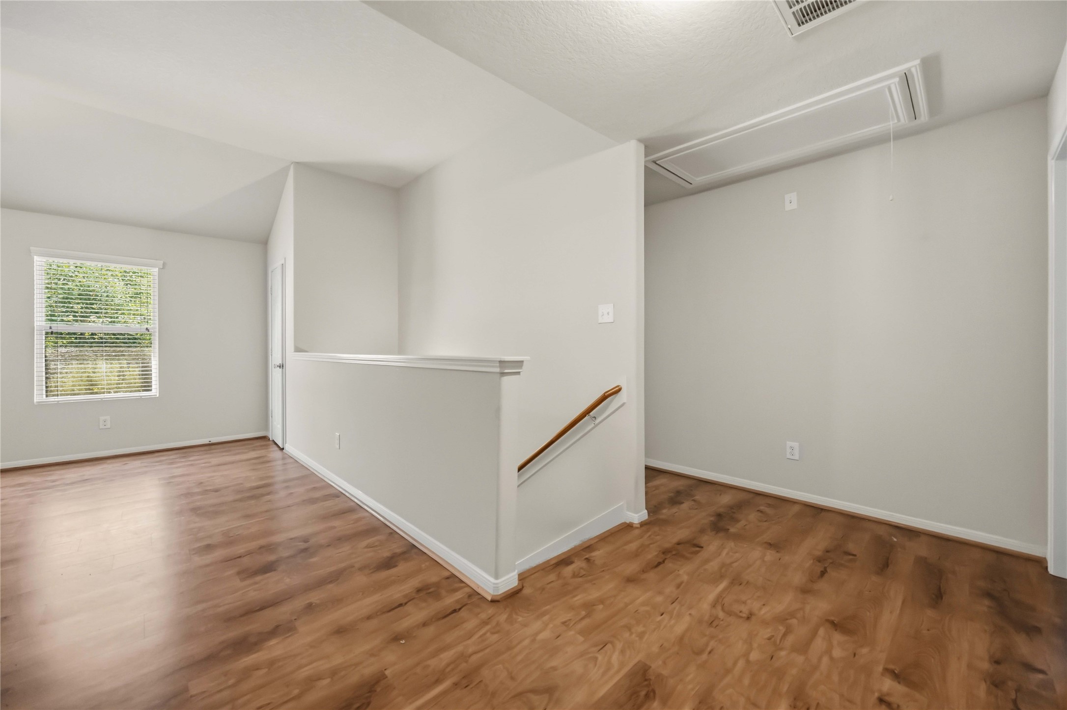 29526 Winton Wood Way Spring, TX 77386 - Photo 15 of 29 Upper landing provides convenient access to the second primary suite, two additional bedrooms, a spacious game room/flex space, laundry room and full bathroom.