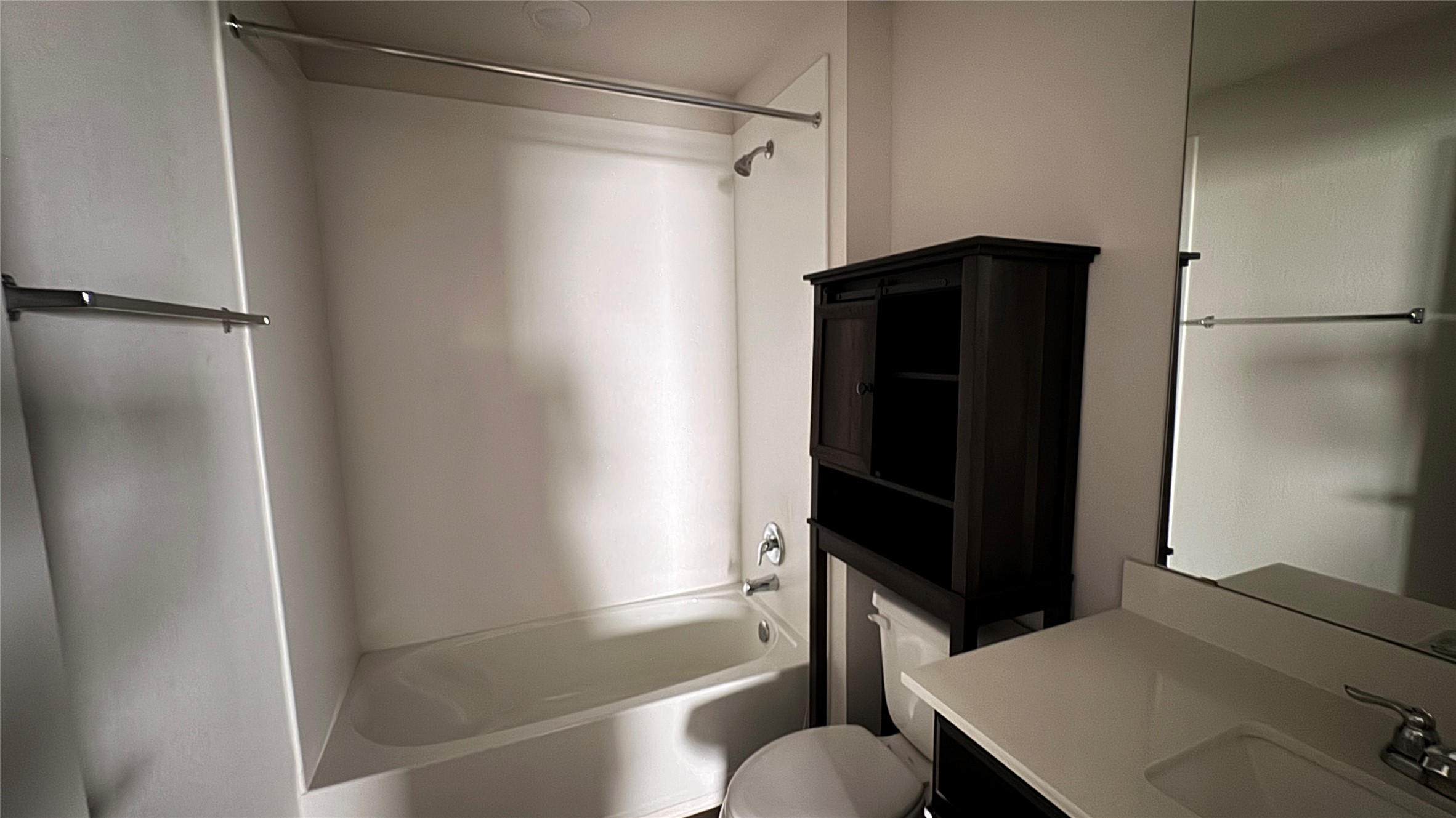 408 Frogmore Loop Kyle, TX 78640 - Photo 20 of 32 A well-maintained bathroom offers essential fixtures and ample storage.