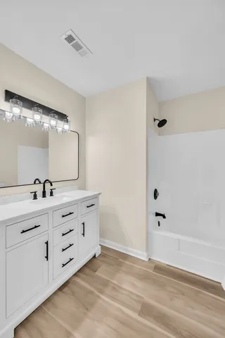 a living room with furniture and a couch