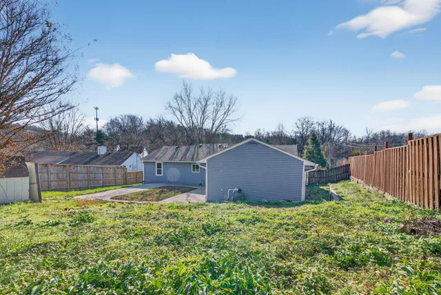 a view of a house with swimming pool