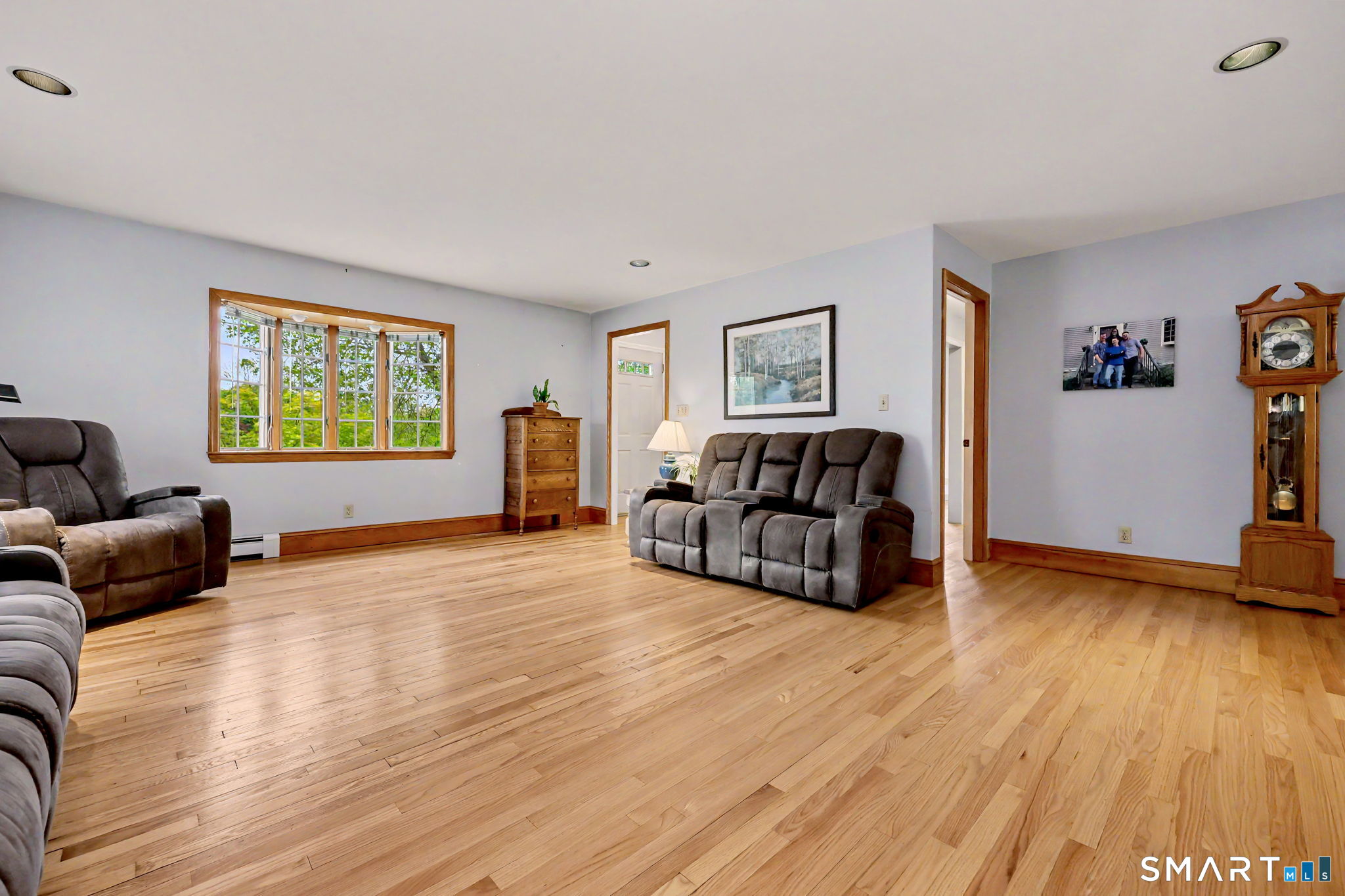 7 Merrill Road Trumbull, CT 06611 - Photo 5 of 40 a living room with furniture and a wooden floor