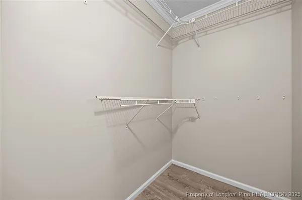 a view of a room with racks on the wall