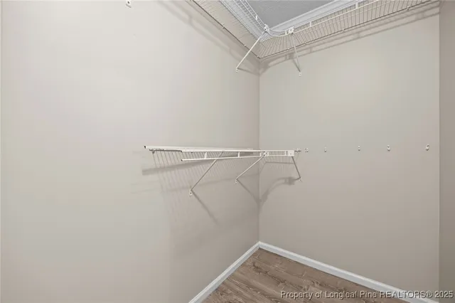 a view of a room with racks on the wall