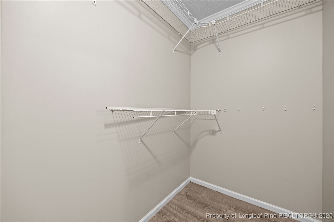 58 Eagle Road Coats, NC 27521 - Photo 13 of 49 a view of a room with racks on the wall