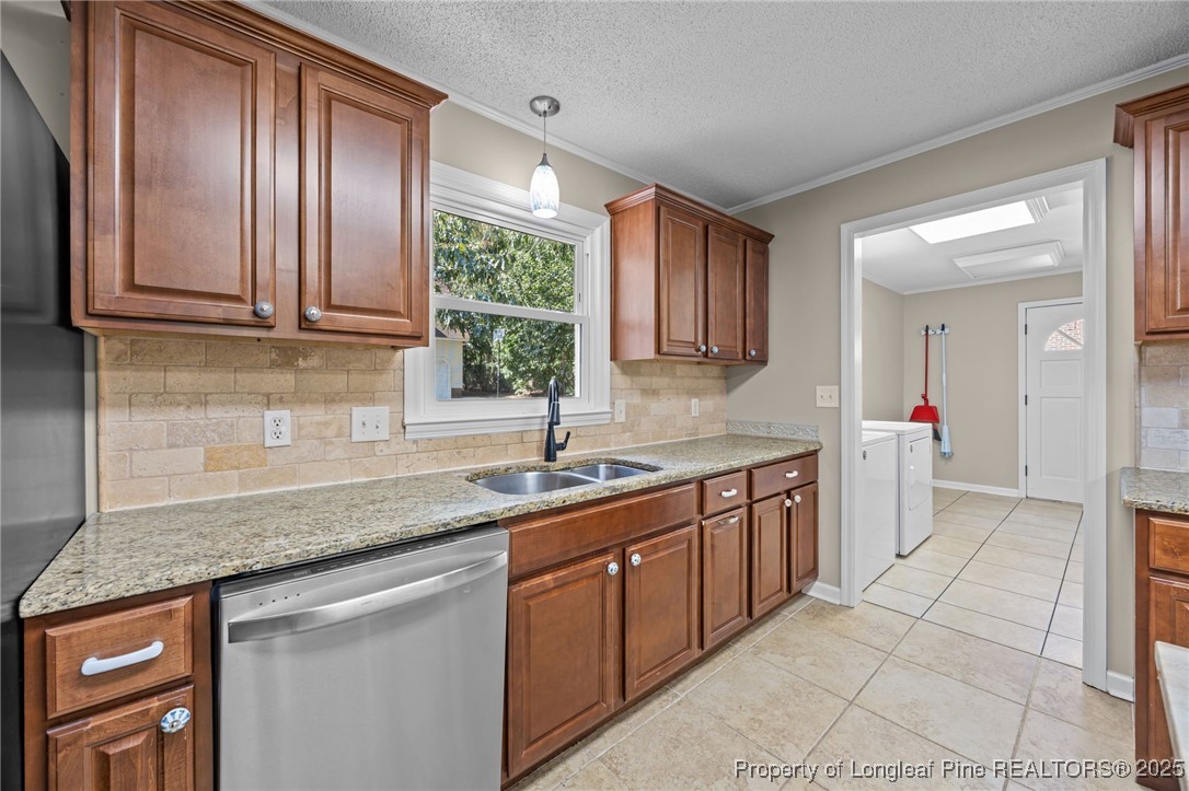 58 Eagle Road Coats, NC 27521 - Photo 28 of 49 a kitchen with a sink stove and cabinets