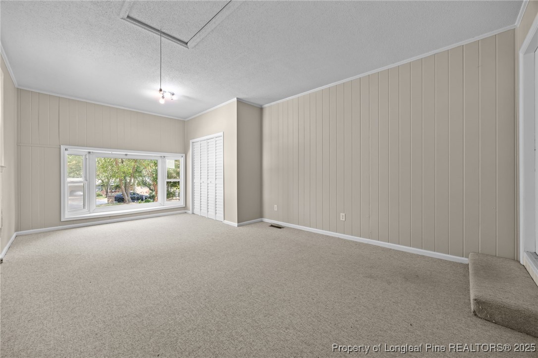 58 Eagle Road Coats, NC 27521 - Photo 30 of 49 an empty room with windows and closet