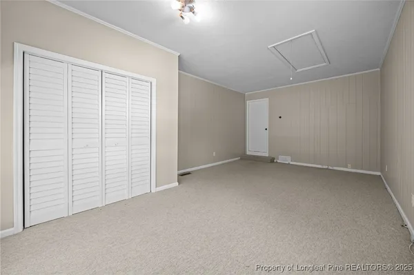 an empty room with closet