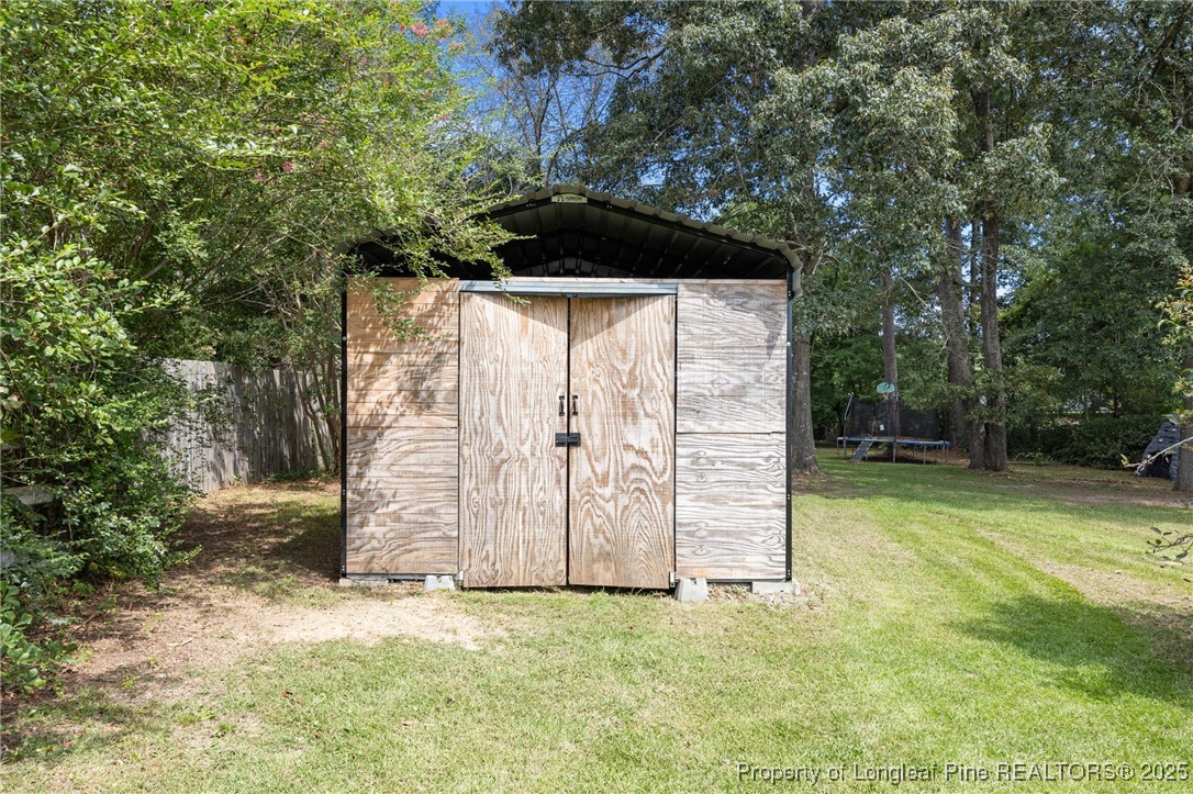 58 Eagle Road Coats, NC 27521 - Photo 43 of 49 a backyard of a house with lots of green space