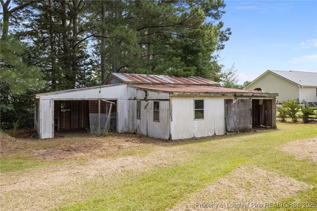 a view of swimming pool with an outdoor space and seating area