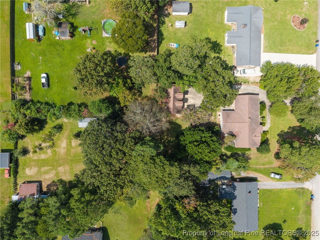 58 Eagle Road Coats, NC 27521 - Photo 47 of 49 an aerial view of a residential houses with outdoor space and trees all around