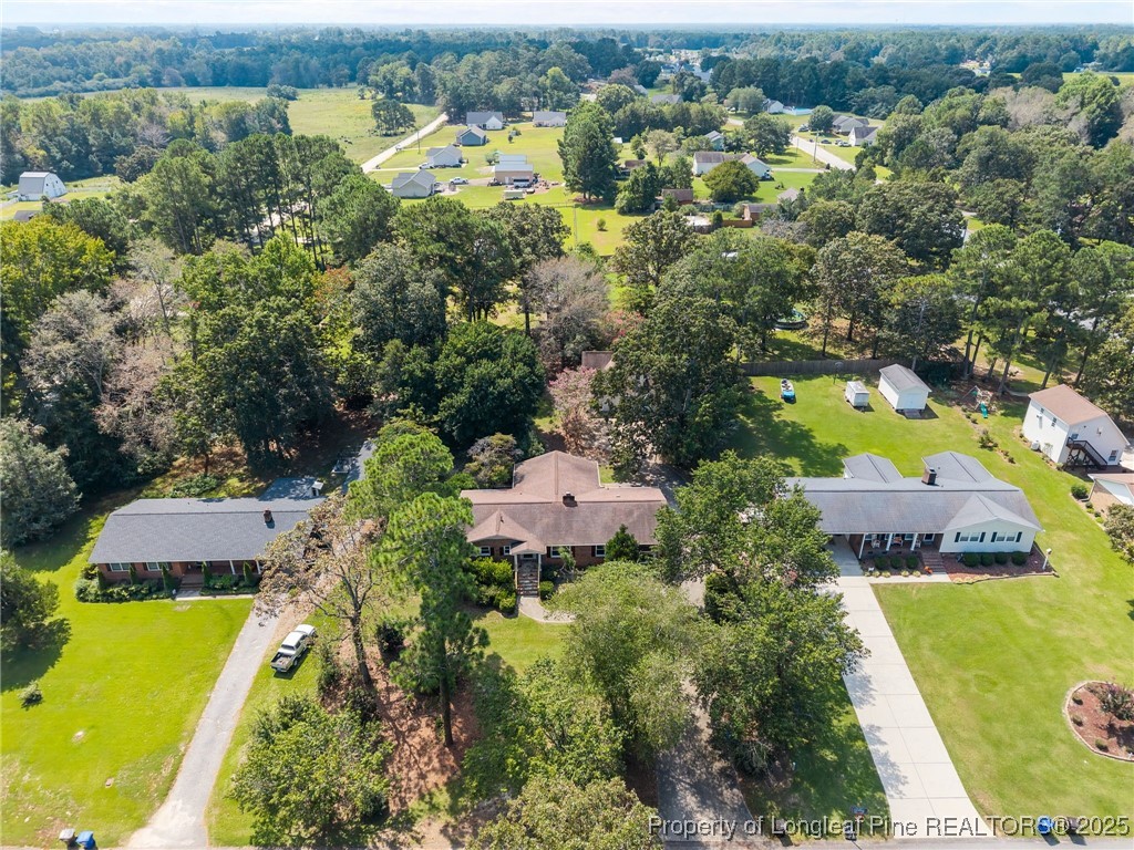 58 Eagle Road Coats, NC 27521 - Photo 49 of 49 an aerial view of residential house with outdoor space and swimming pool