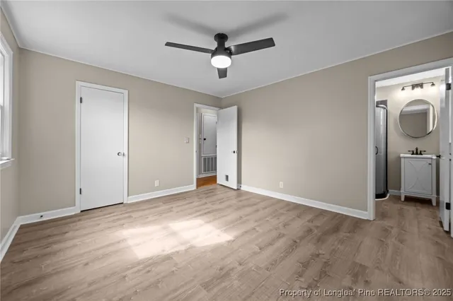a view of an empty room with a washer and dryer