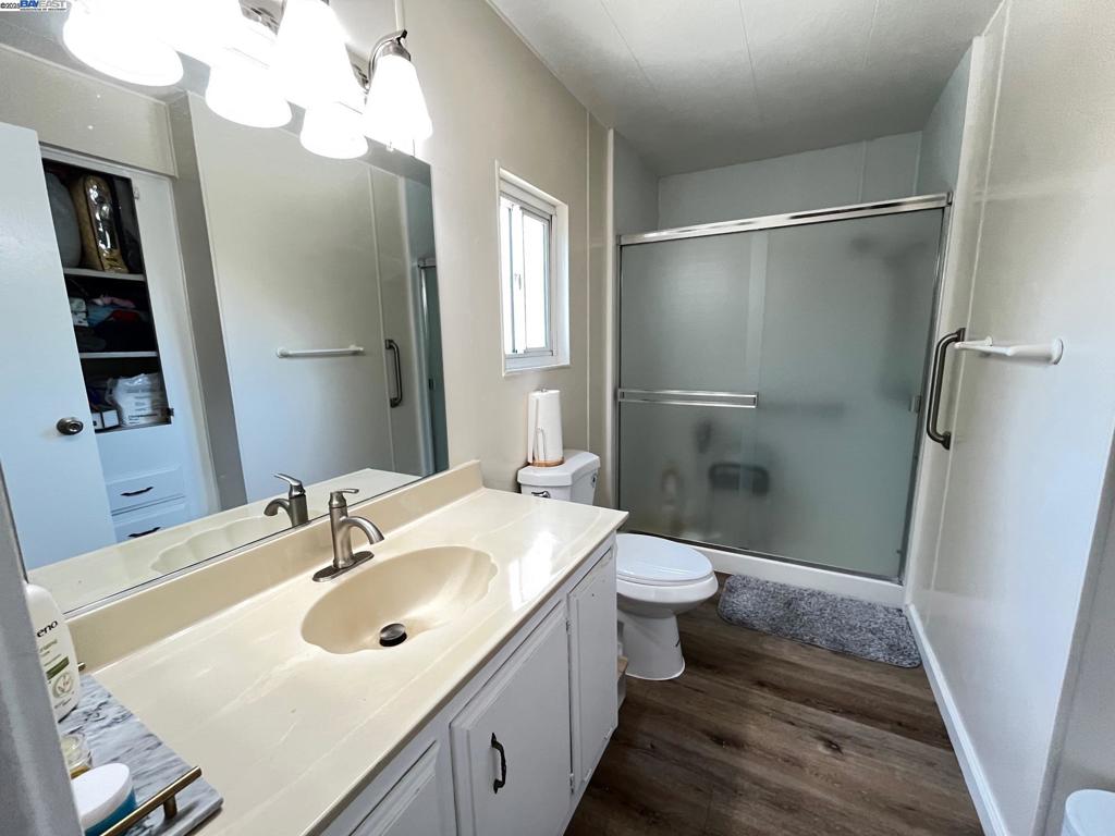 711 Old Canyon Road Fremont, CA 94536 - Photo 16 of 29 a bathroom with a sink toilet and shower