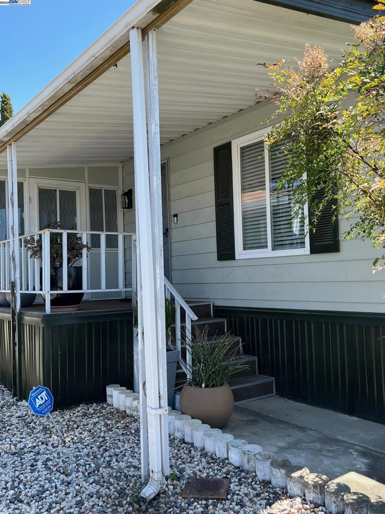 711 Old Canyon Road Fremont, CA 94536 - Photo 19 of 29 a view of a house with a backyard