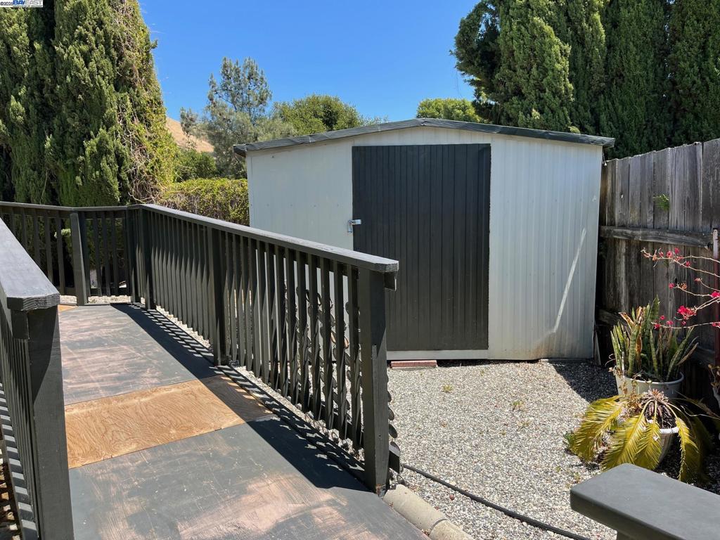 711 Old Canyon Road Fremont, CA 94536 - Photo 23 of 29 a balcony with wooden floor