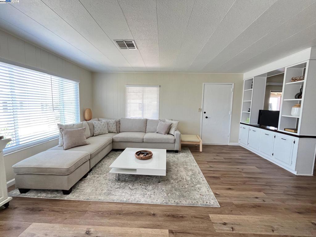 711 Old Canyon Road Fremont, CA 94536 - Photo 4 of 29 a living room with furniture and a rug