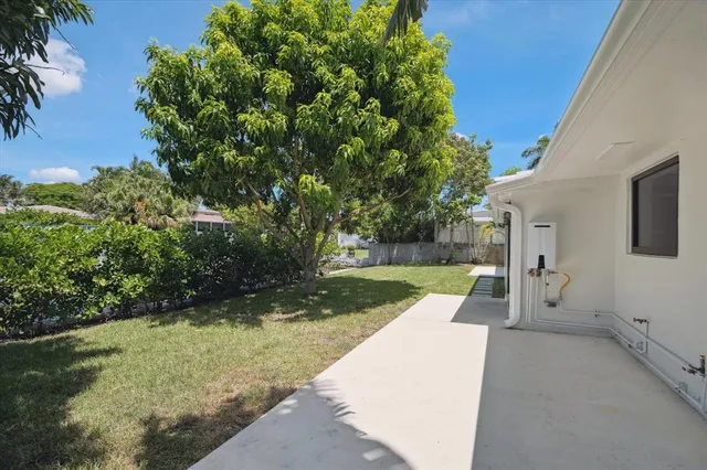 a view of backyard with green space