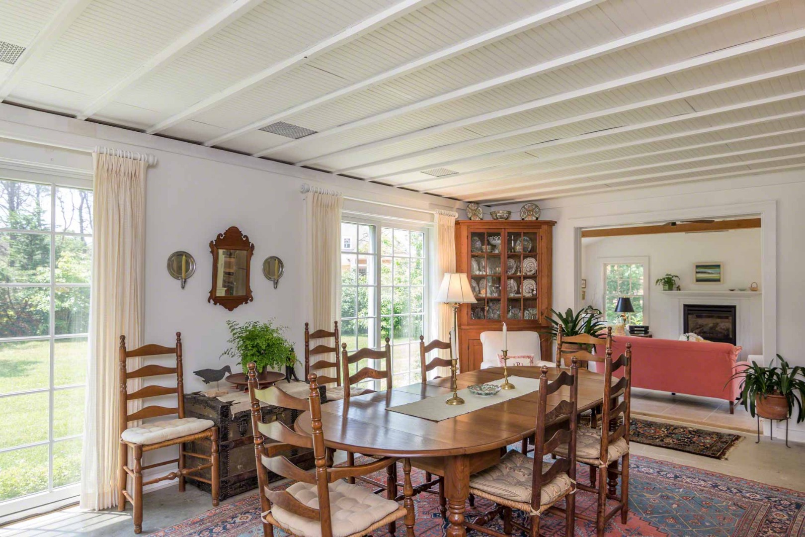 1 Garden Cove Road Edgartown, MA 02539 - Photo 13 of 37 a view of a dining room with furniture window and outside view