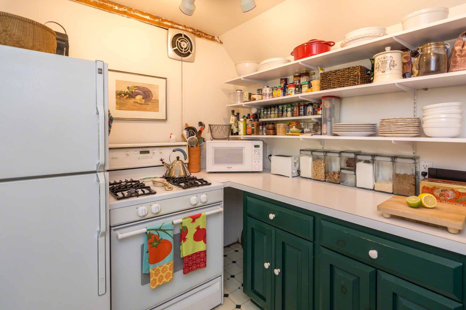 1 Garden Cove Road Edgartown, MA 02539 - Photo 19 of 37 a kitchen with stainless steel appliances a stove and a refrigerator