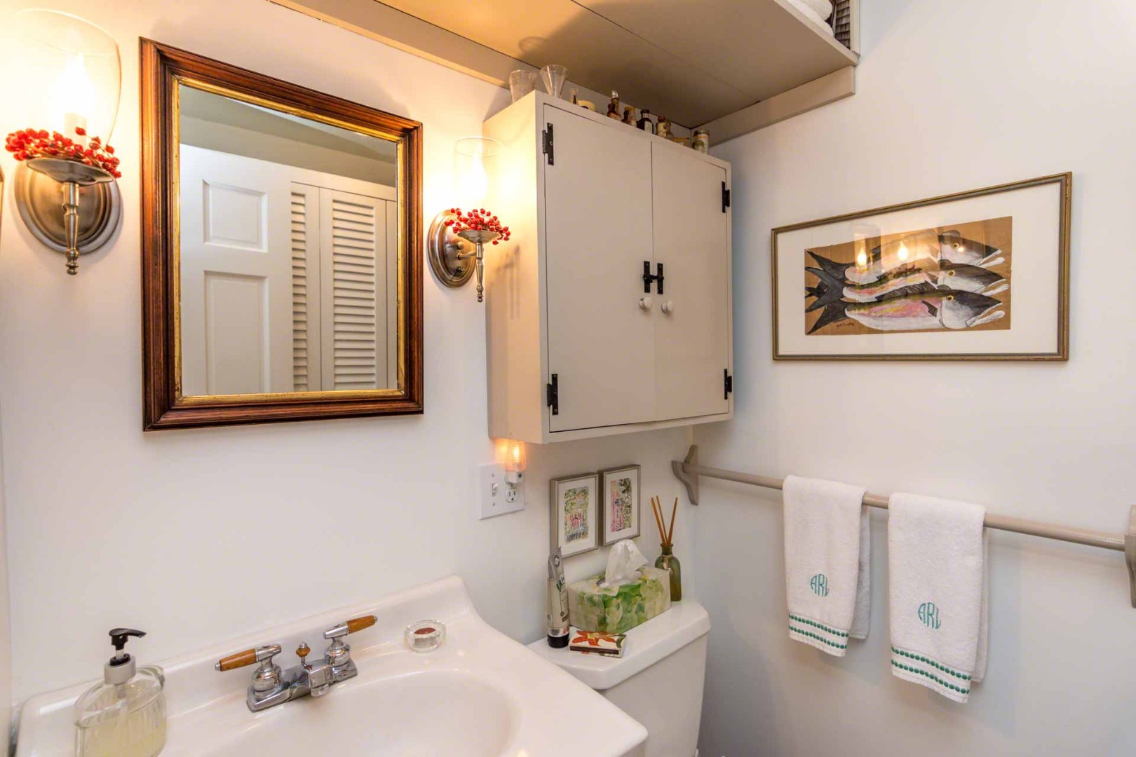 1 Garden Cove Road Edgartown, MA 02539 - Photo 26 of 37 a bathroom with a sink and a mirror