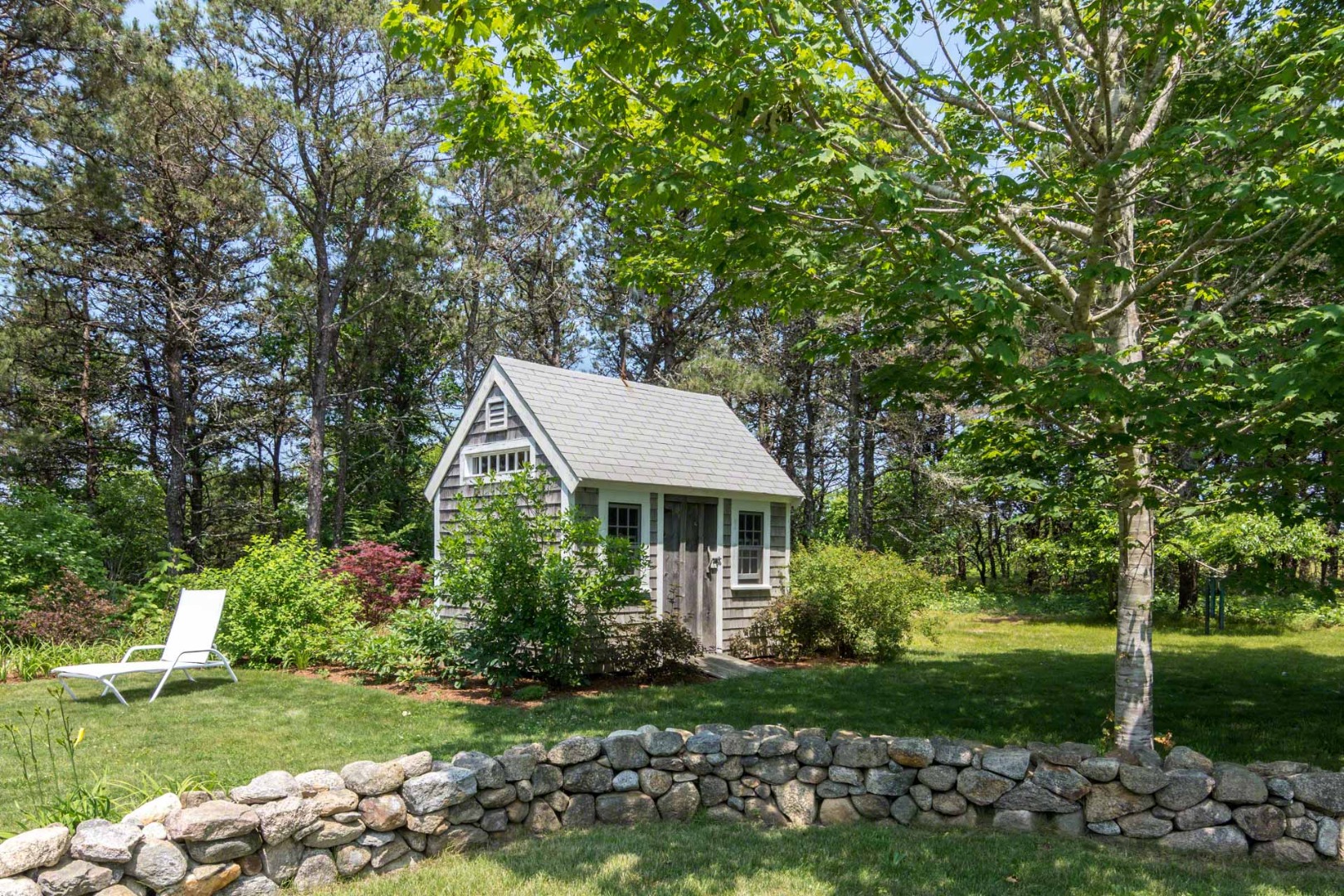 1 Garden Cove Road Edgartown, MA 02539 - Photo 35 of 37 a front view of a house with garden