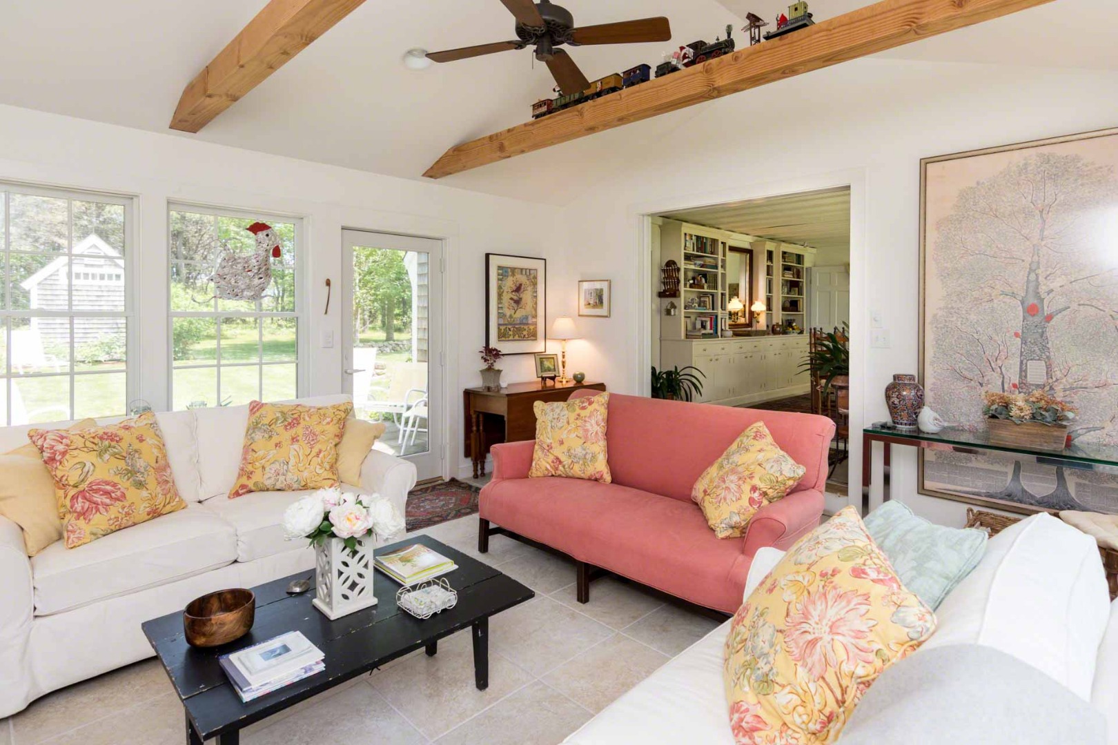 1 Garden Cove Road Edgartown, MA 02539 - Photo 10 of 37 a living room with furniture a rug and a table