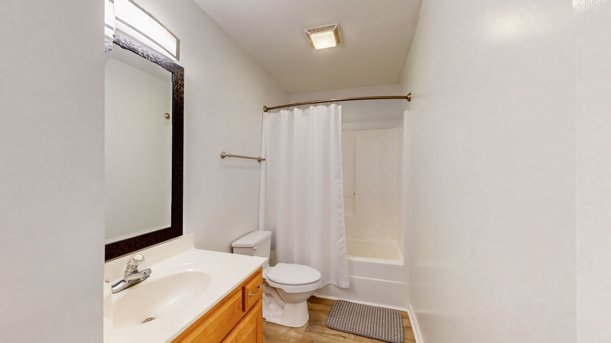 500 Sheath Circle Lebanon, TN 37087 - Photo 12 of 29 a white toilet sitting next to a bathroom sink