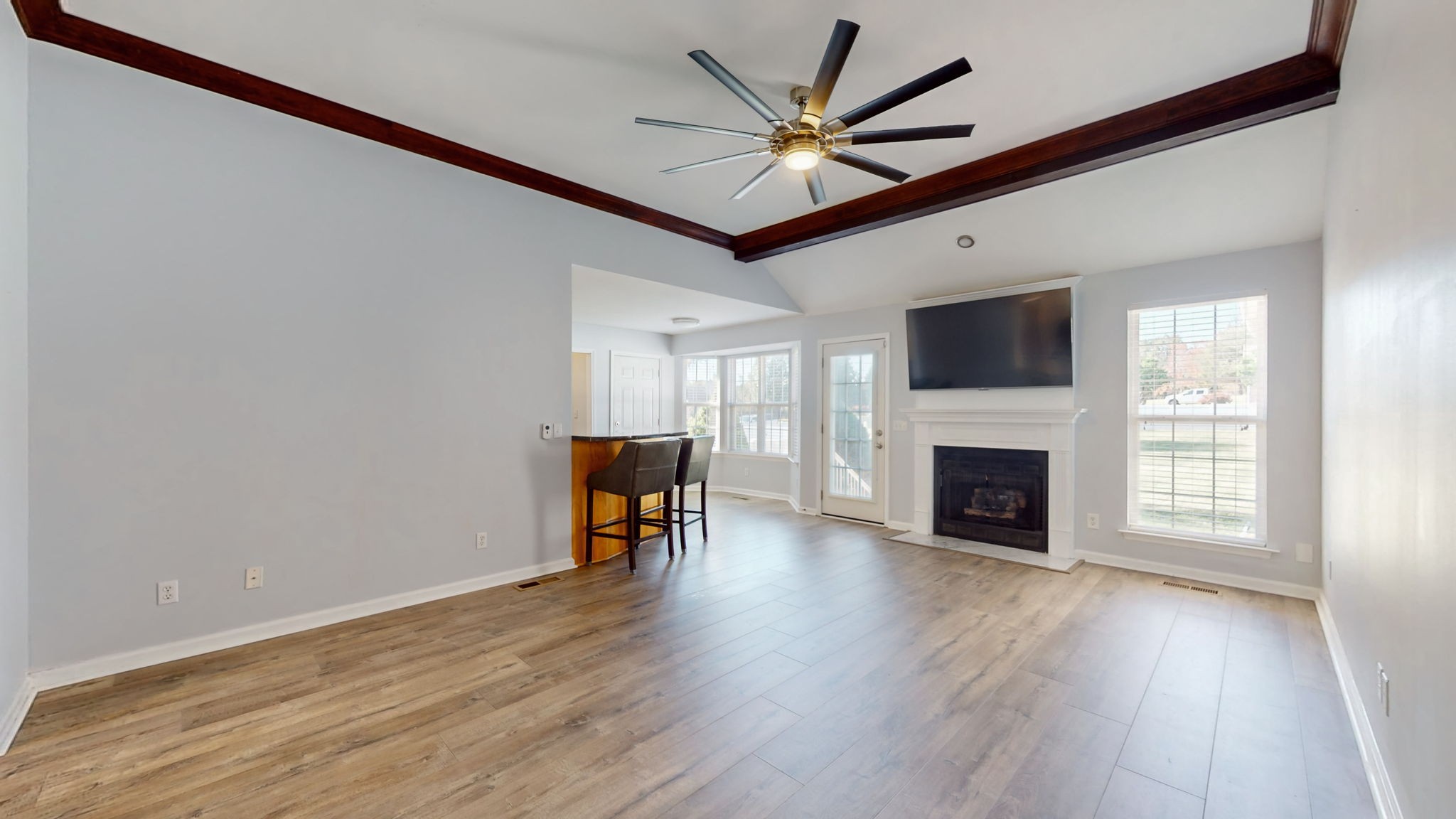 500 Sheath Circle Lebanon, TN 37087 - Photo 2 of 29 a view of a livingroom with a fireplace a ceiling fan and wooden floor
