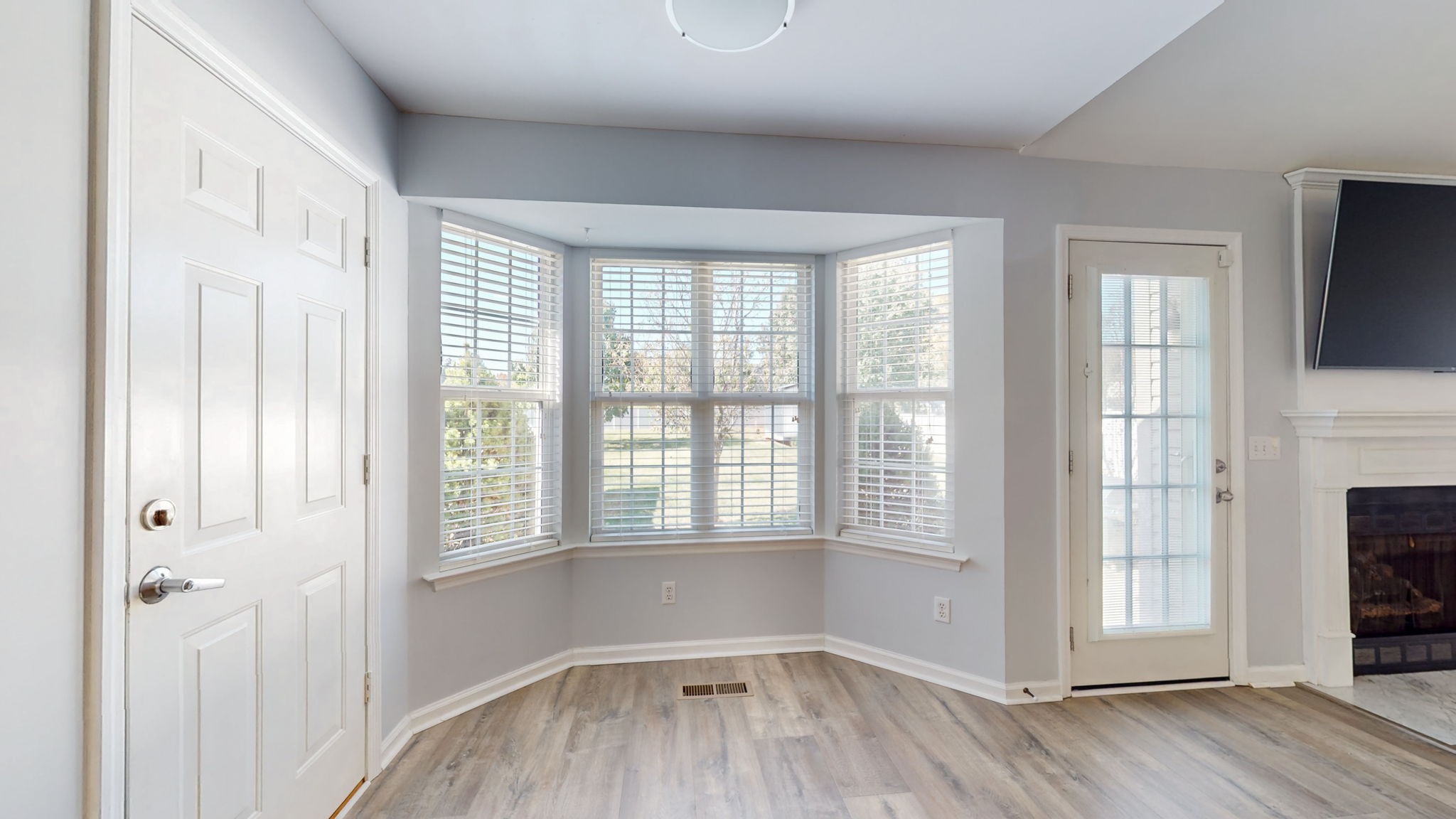500 Sheath Circle Lebanon, TN 37087 - Photo 3 of 29 a view of an empty room with a window and wooden floor