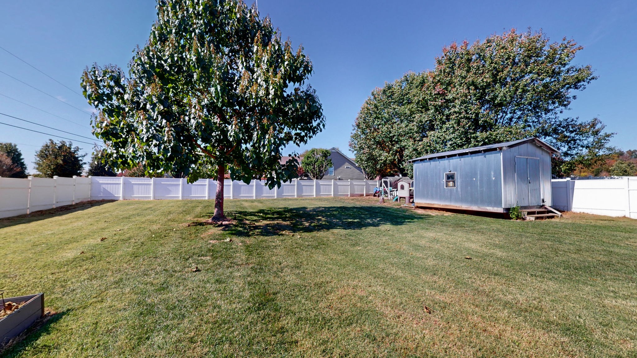 500 Sheath Circle Lebanon, TN 37087 - Photo 7 of 29 a backyard of a house with trees and entertaining space