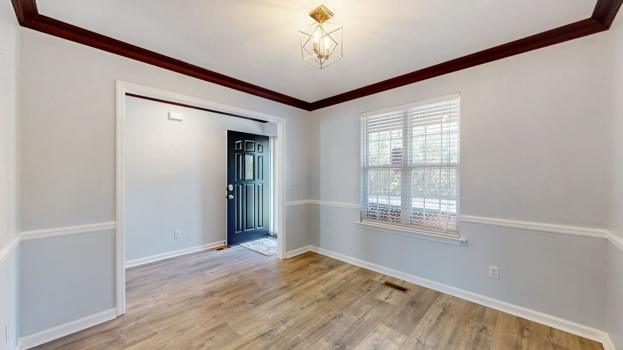 500 Sheath Circle Lebanon, TN 37087 - Photo 10 of 29 a view of an empty room with window and wooden floor