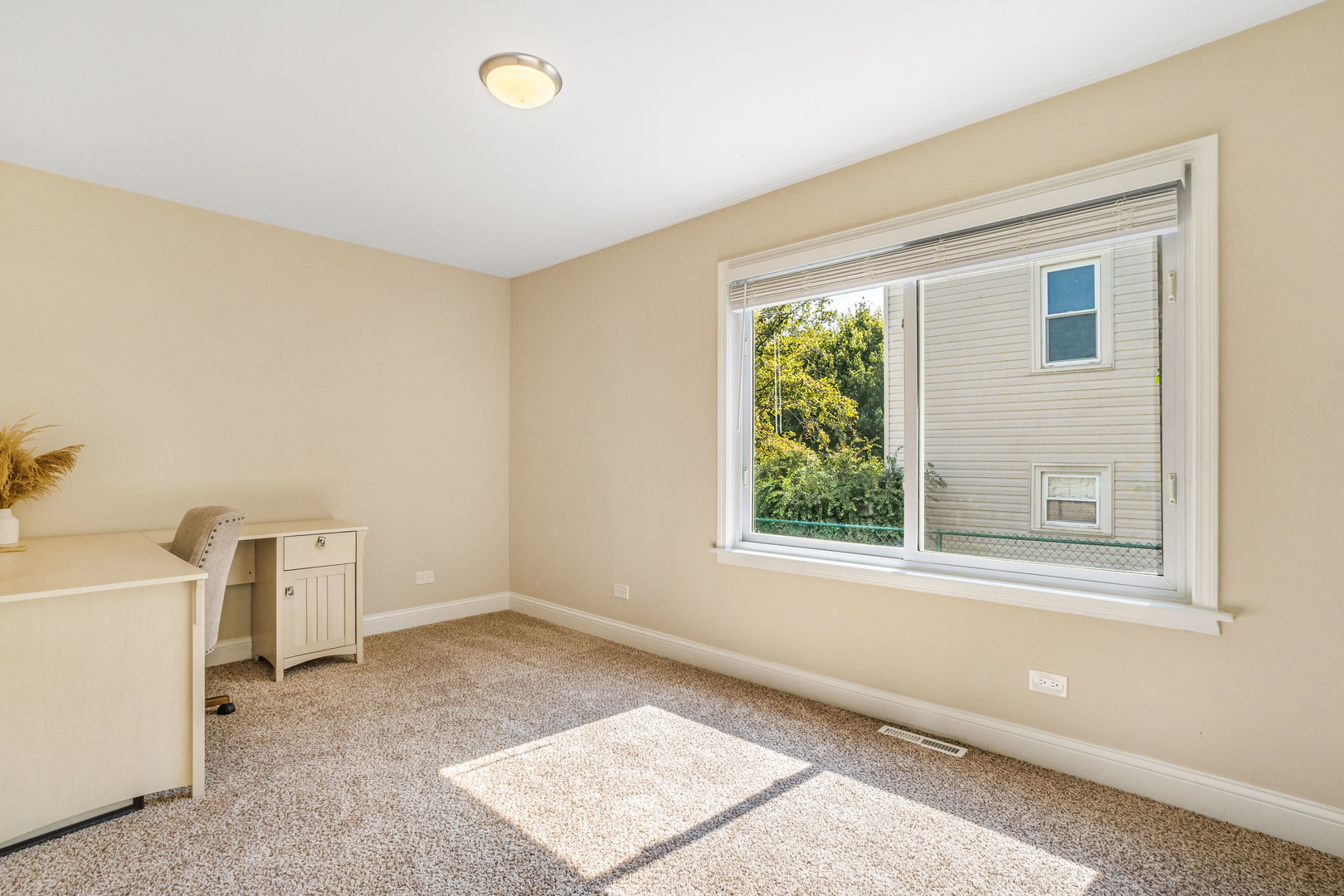 7510 Thomas Avenue Bridgeview, IL 60455 - Photo 13 of 25 a view of a livingroom with a dishwasher and a window