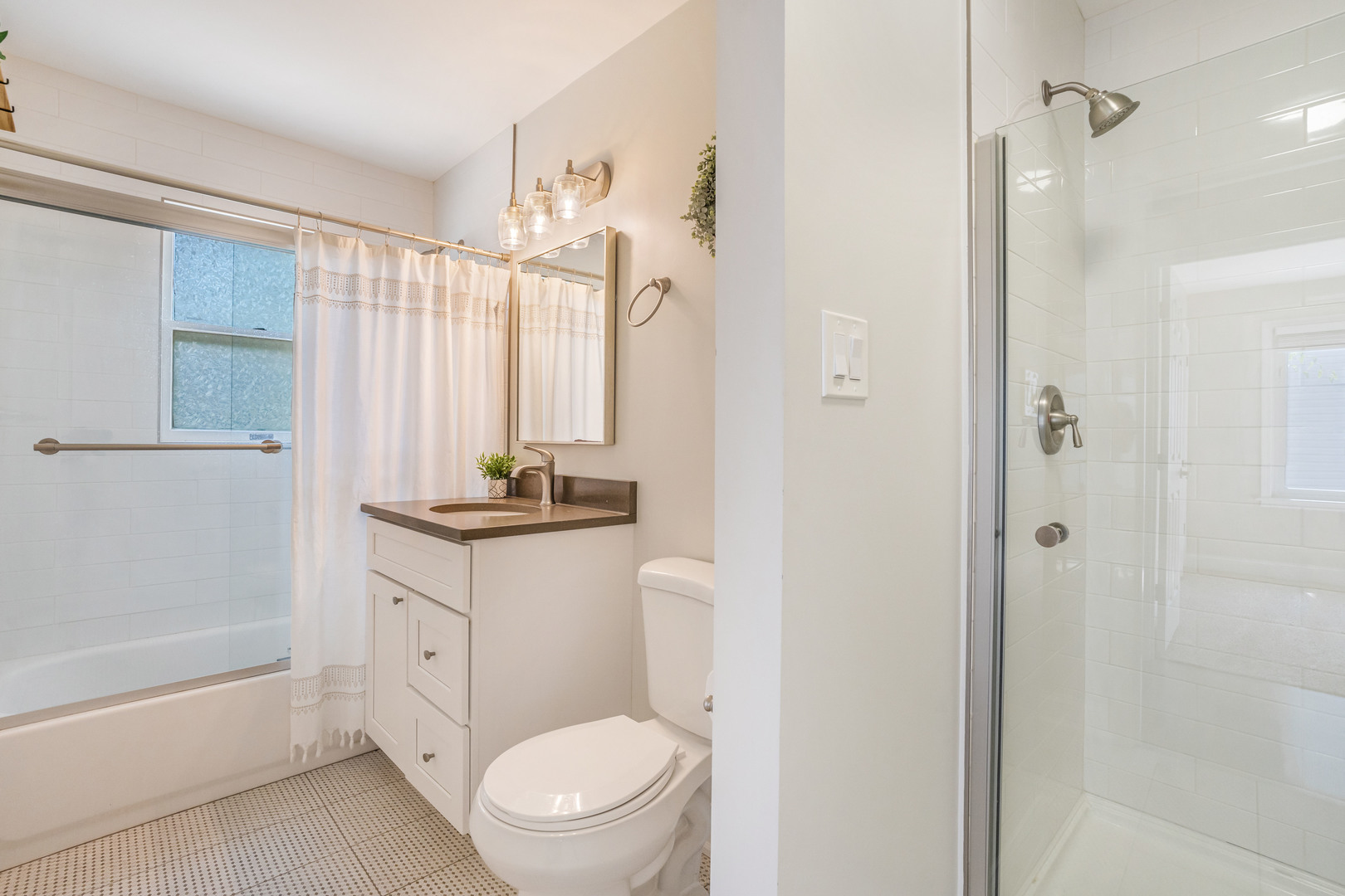 7510 Thomas Avenue Bridgeview, IL 60455 - Photo 16 of 25 a bathroom with a sink a toilet and shower