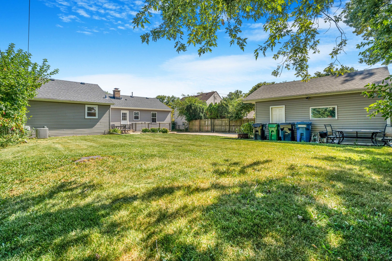 7510 Thomas Avenue Bridgeview, IL 60455 - Photo 21 of 25 a house view with swimming pool in front of it