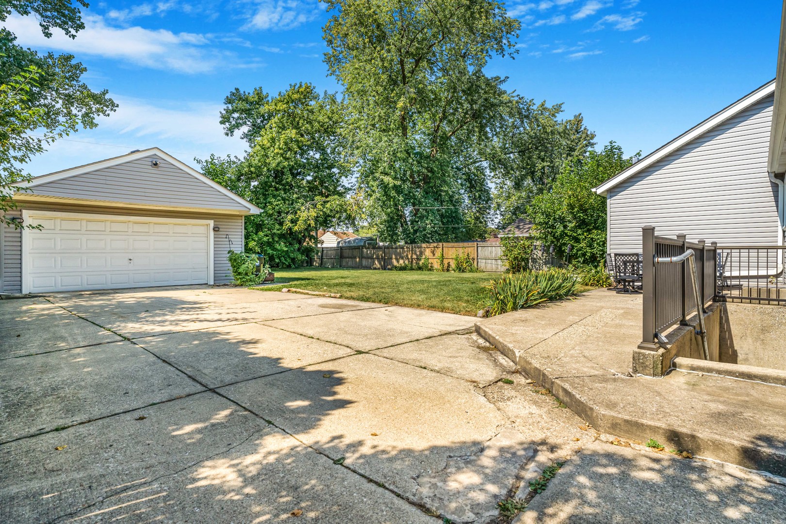7510 Thomas Avenue Bridgeview, IL 60455 - Photo 22 of 25 a view of a backyard house with a patio