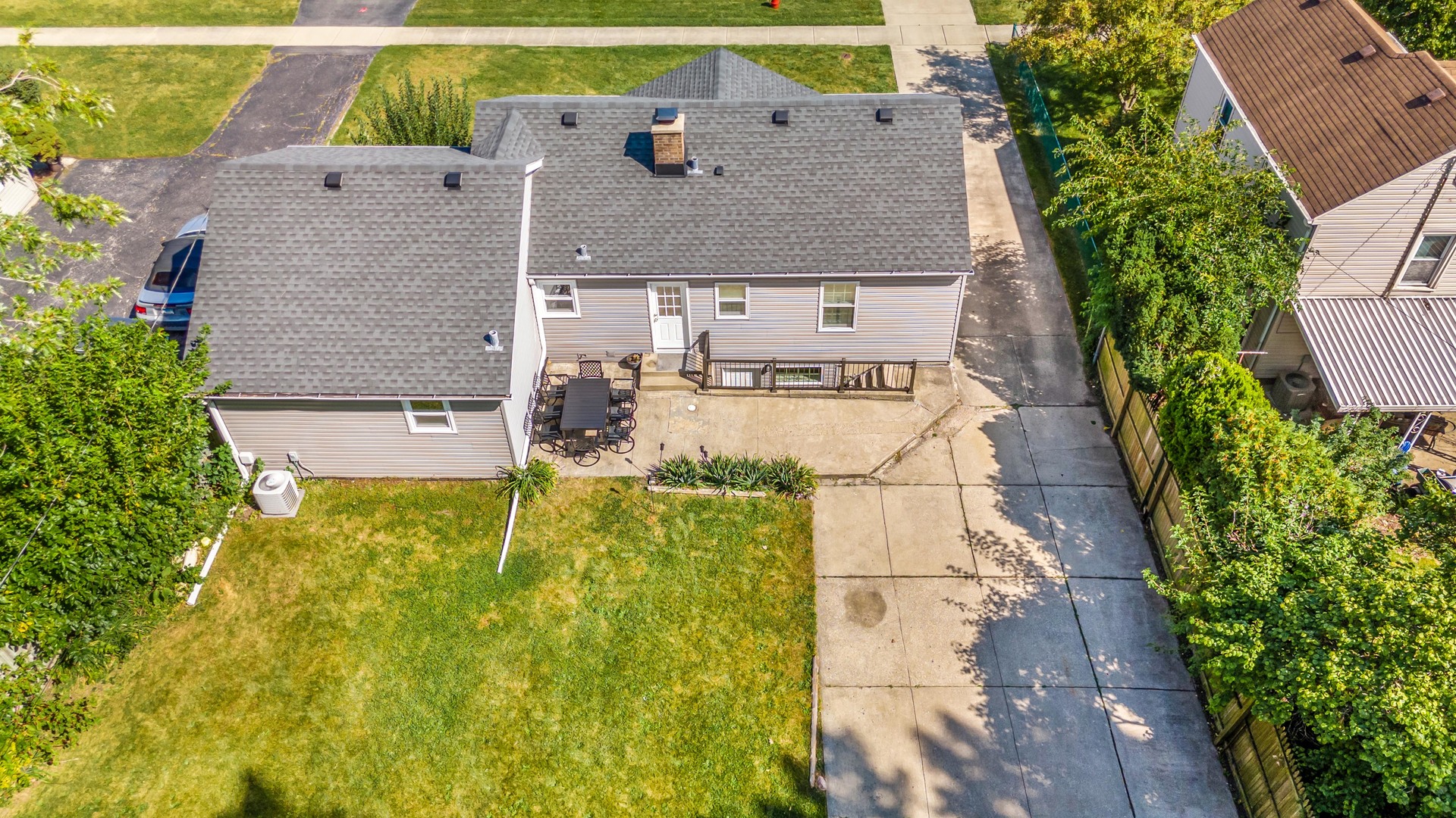 7510 Thomas Avenue Bridgeview, IL 60455 - Photo 23 of 25 an aerial view of residential house with pool and yard