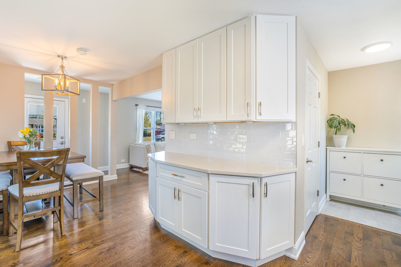 7510 Thomas Avenue Bridgeview, IL 60455 - Photo 6 of 25 a kitchen with granite countertop white cabinets and white appliances