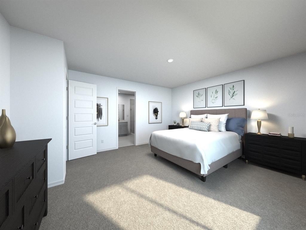 3329 Orchard Loop Bartow, FL 33830 - Photo 6 of 6 a bedroom with a bed and lamp