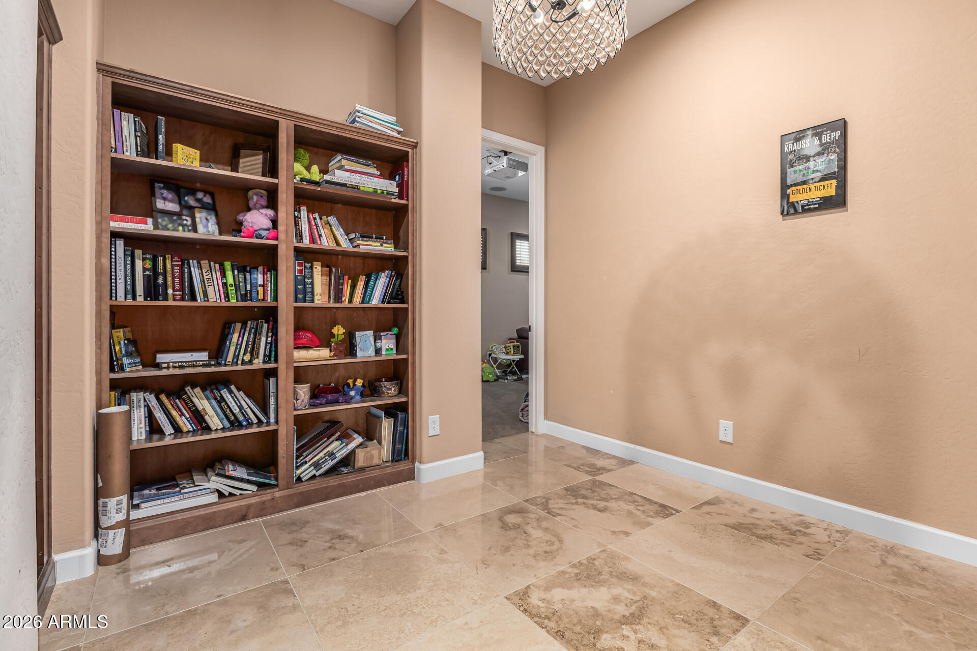3139 East Harwell Road Phoenix, AZ 85042 - Photo 27 of 45 a view of room with small book shelves