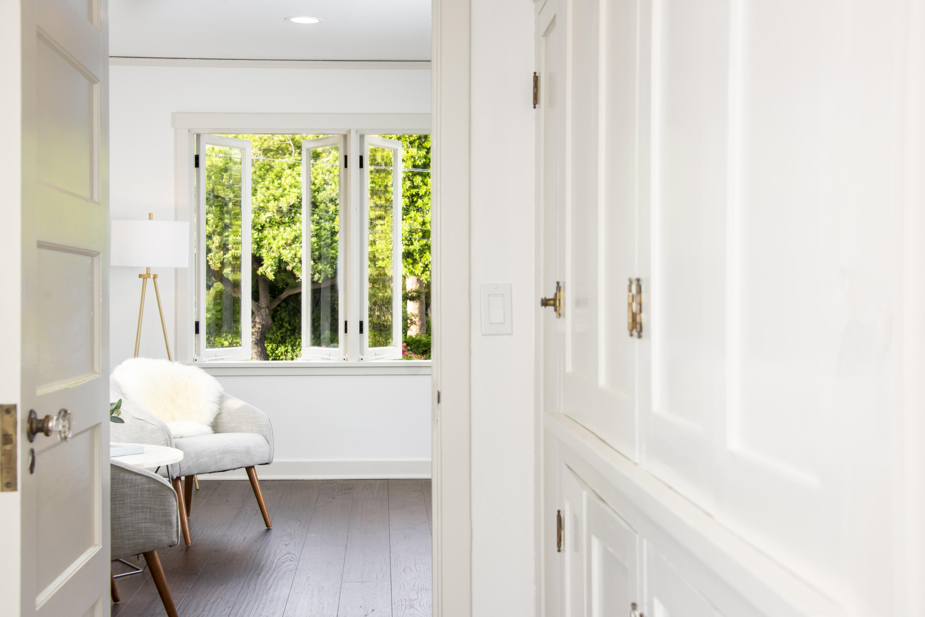 1817 Anacapa Street Santa Barbara, CA 93101 - Photo 11 of 19 a view of a hallway with furniture and a window