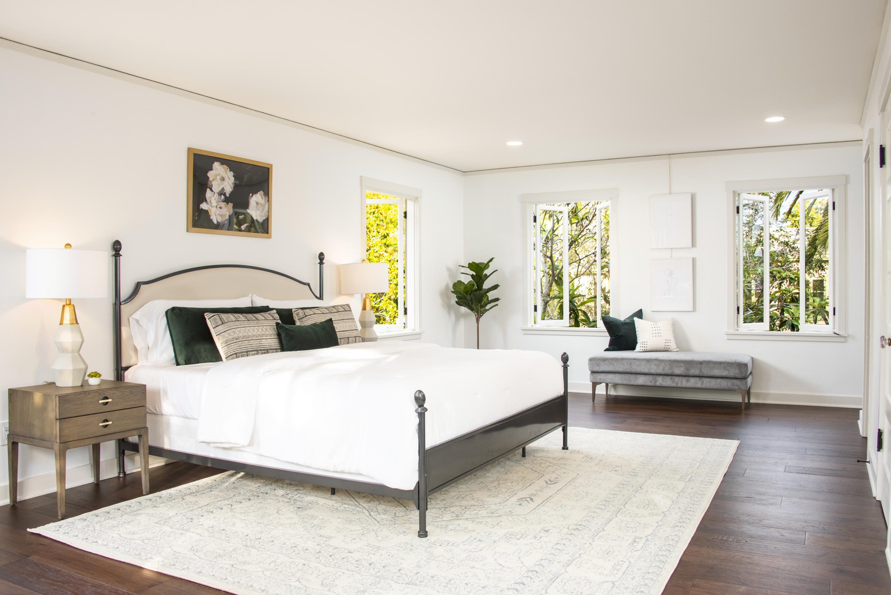 1817 Anacapa Street Santa Barbara, CA 93101 - Photo 12 of 19 a bedroom with a bed wooden floor and window