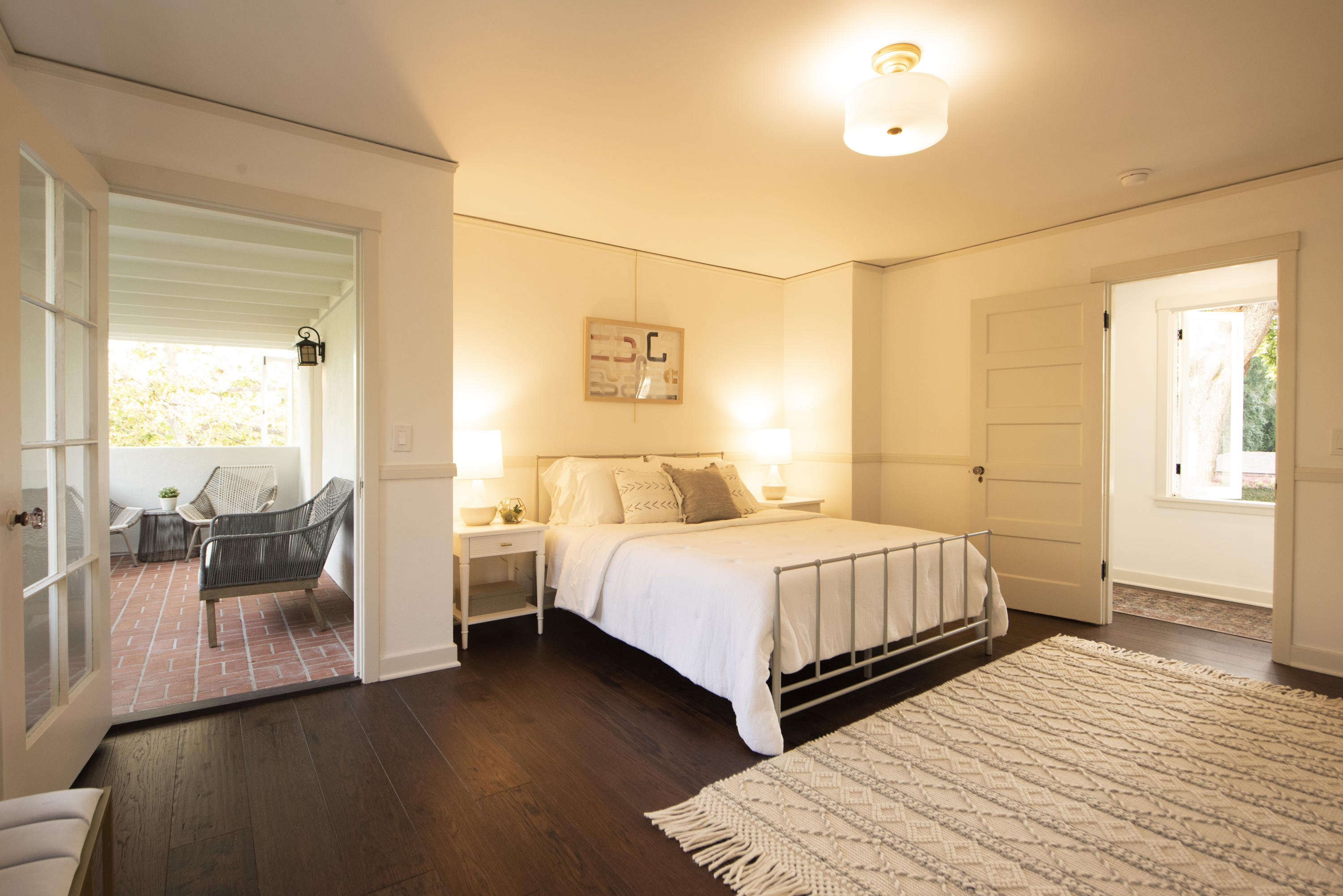 1817 Anacapa Street Santa Barbara, CA 93101 - Photo 13 of 19 a bedroom with two beds and painting on the wall