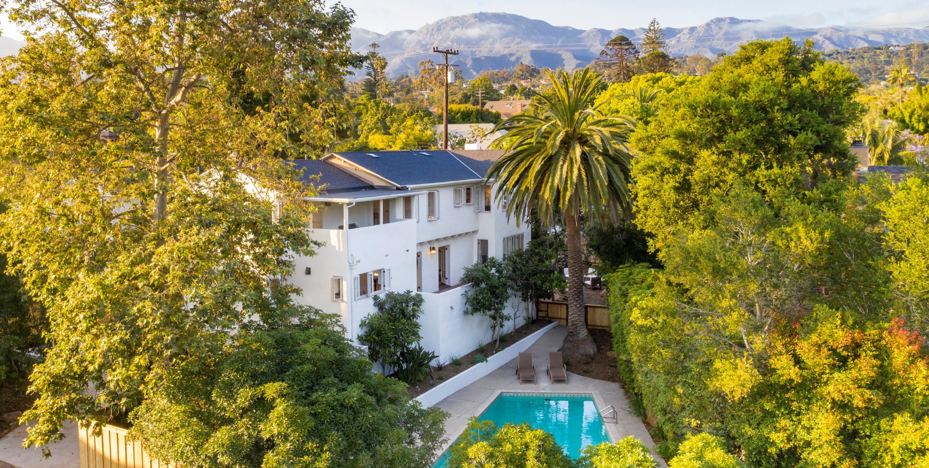 1817 Anacapa Street Santa Barbara, CA 93101 - Photo 2 of 19 a view of a multi story tree and a yard