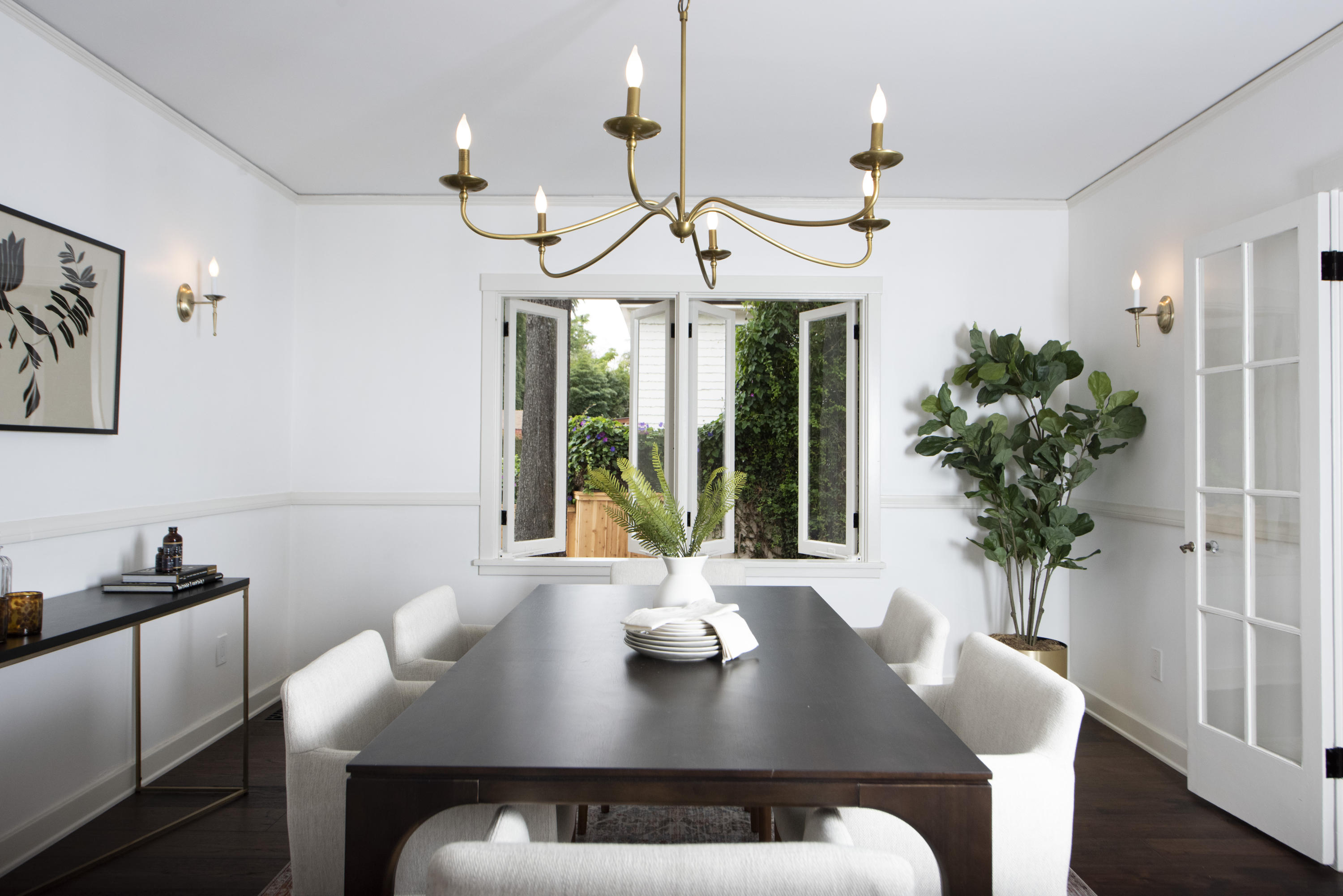 1817 Anacapa Street Santa Barbara, CA 93101 - Photo 8 of 19 a view of a dining room with furniture window and wooden floor