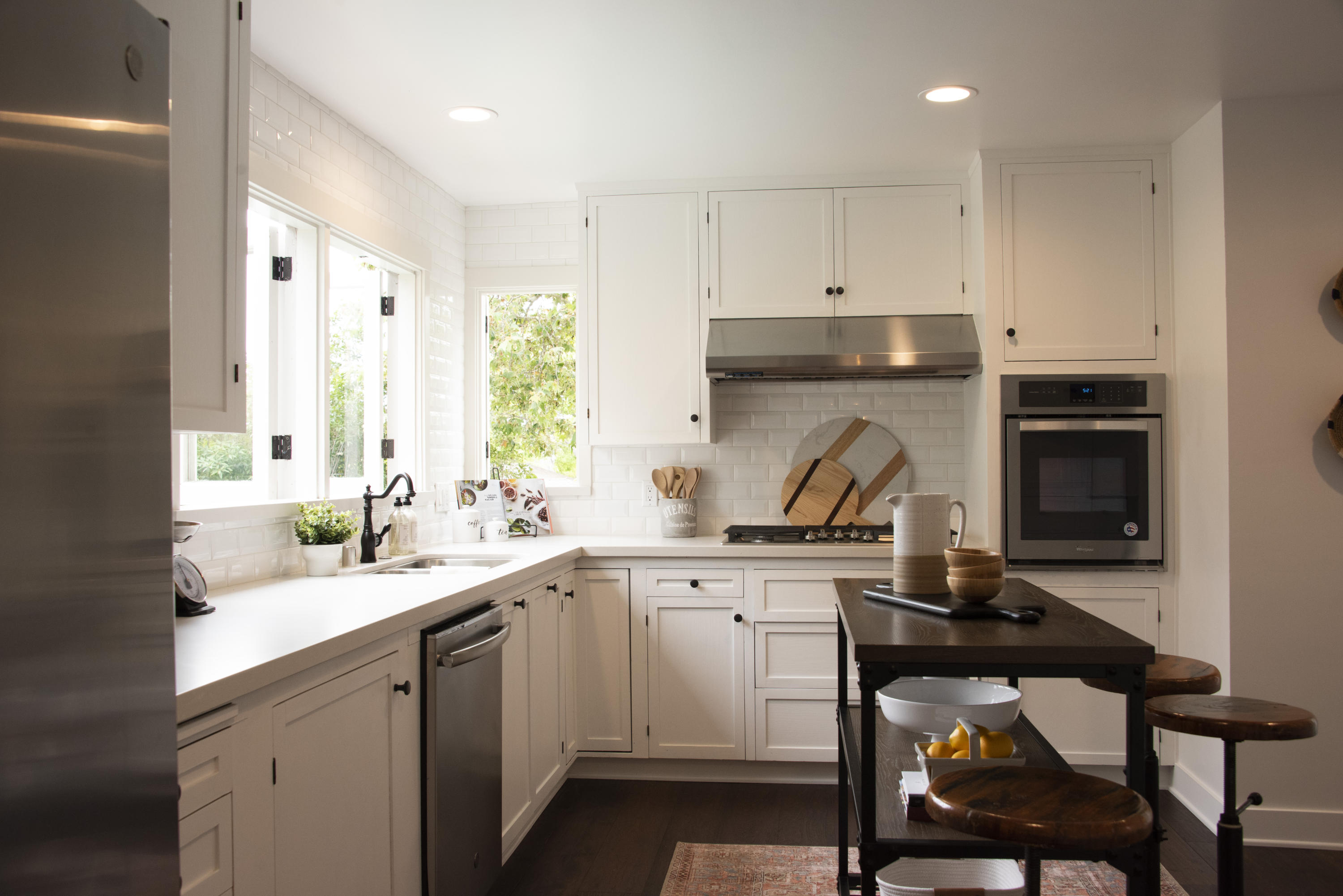 1817 Anacapa Street Santa Barbara, CA 93101 - Photo 9 of 19 a kitchen with a sink cabinets and window