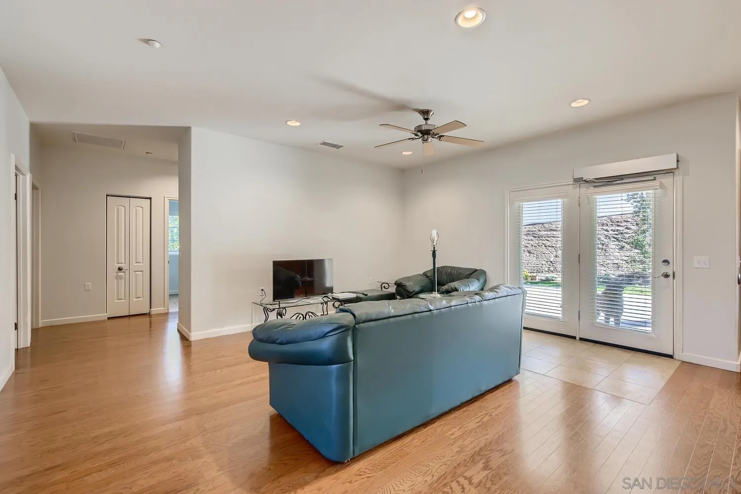 28553 Sunset Road Valley Center, CA 92082 - Photo 10 of 28 a living room with furniture and a flat screen tv