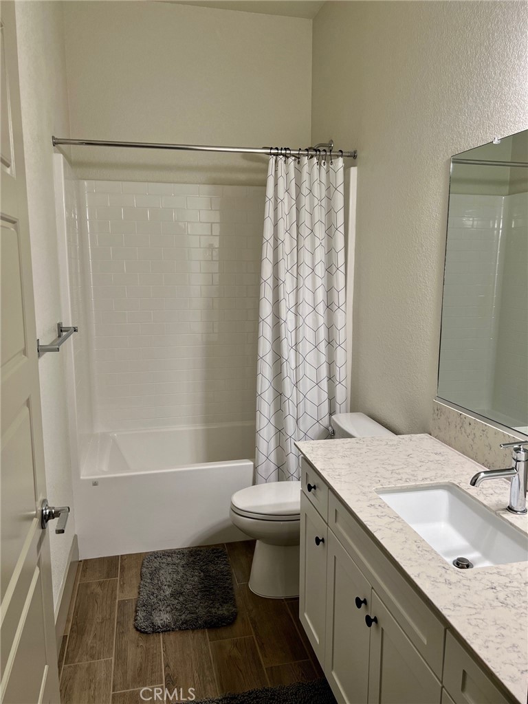 3751 Gabriel Drive Merced, CA 95340 - Photo 18 of 30 a bathroom with a granite countertop sink toilet and shower