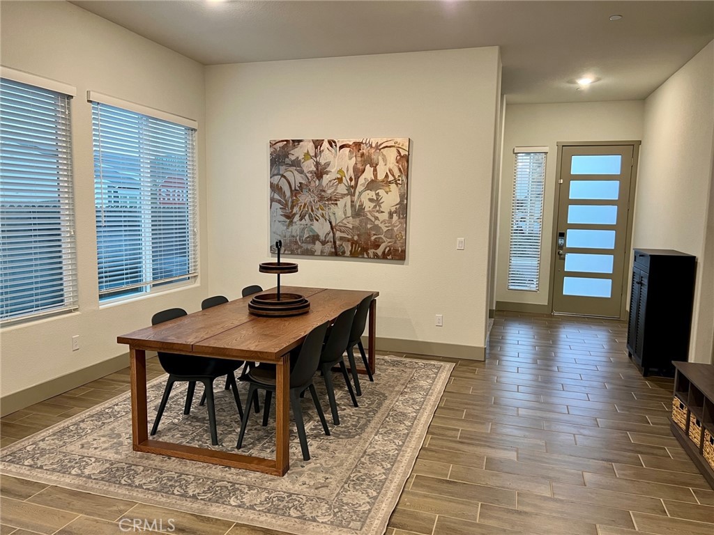 3751 Gabriel Drive Merced, CA 95340 - Photo 2 of 30 a view of a dining room with furniture and wooden floor