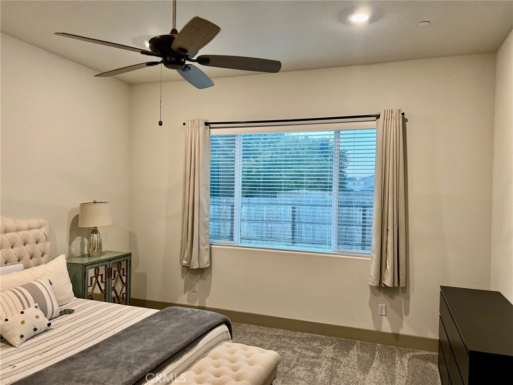 3751 Gabriel Drive Merced, CA 95340 - Photo 22 of 30 a bedroom with a bed and a window